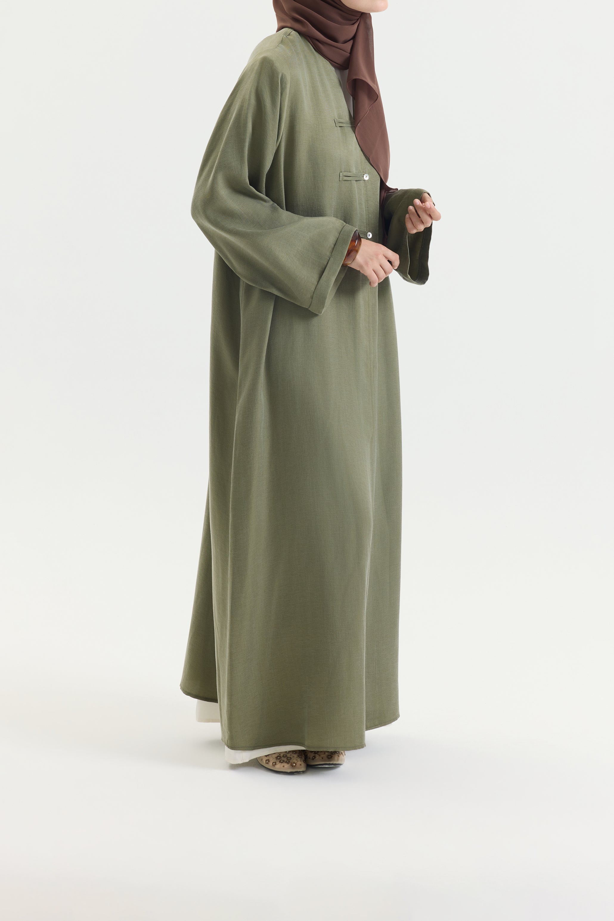 BRİT DETAYLI YEŞİL KUPRA ABAYA Hubab Abaya