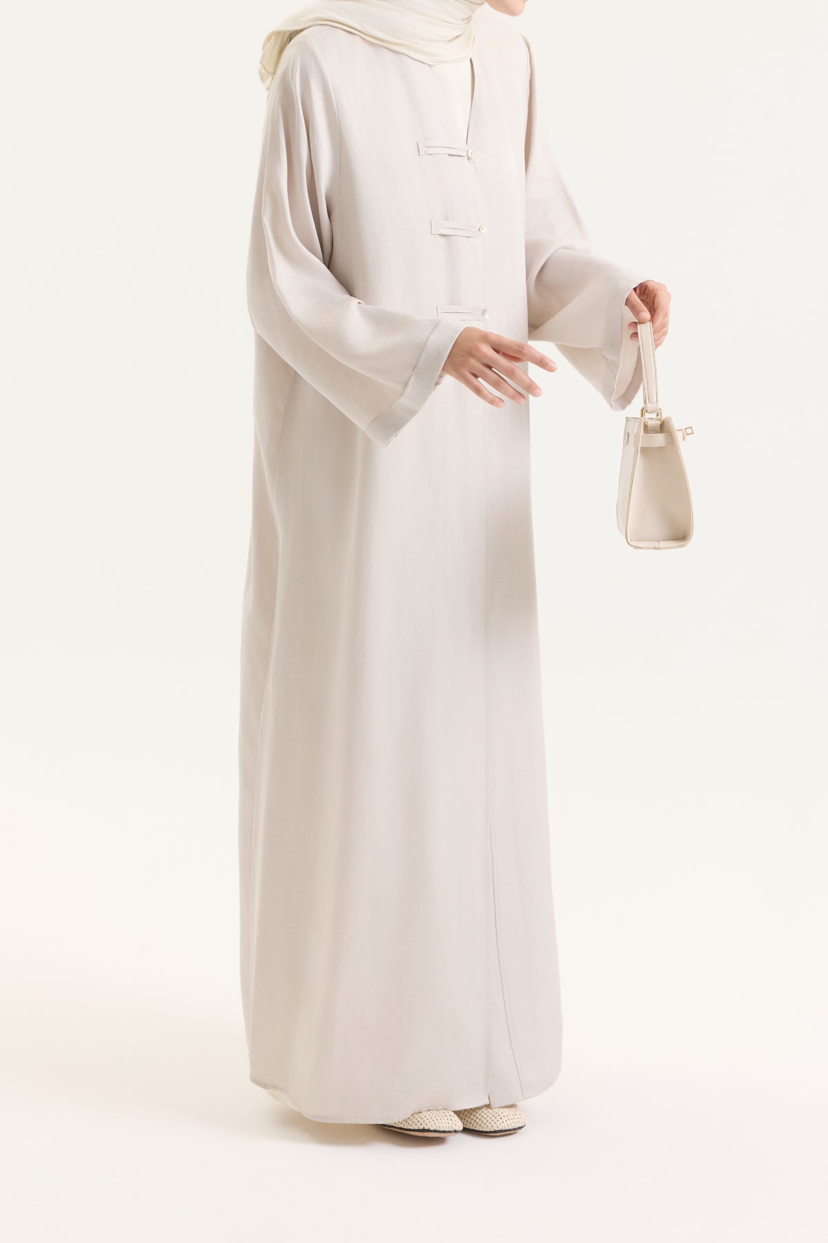 BRİT DETAYLI İNCİ KUPRA ABAYA Hubab Abaya